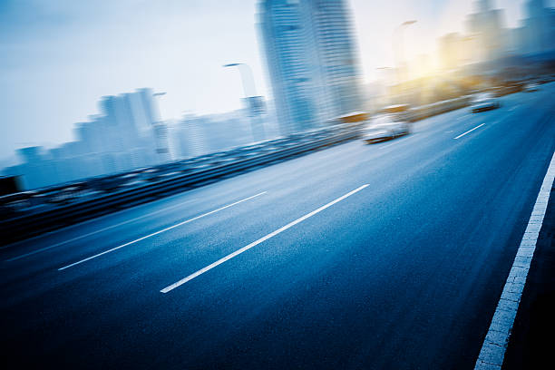 istock traffic on highway,with city background,chongqing 538452780