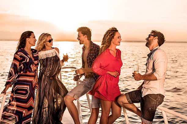 istock Young people on a yacht at sunset. 538454257