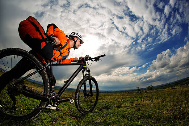 istock Young man is riding bicycle outside. Healthy Lifestyle. 538455908