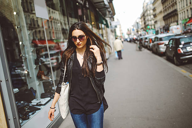 istock Young Parisian woman walking 538459548