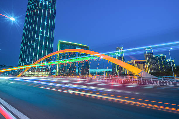 istock motion blurred car at bridge,tianjin city 538461230