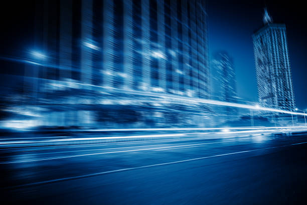 istock motion blurred car at bridge,tianjin city 538462102