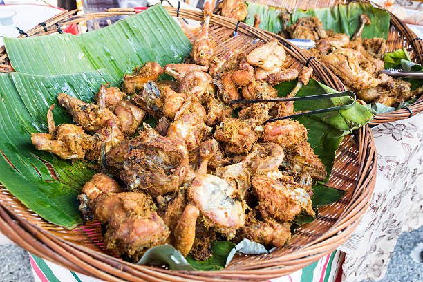 istock Fried chicken with spice, popular at food bazaar during Ramadan. 538464632