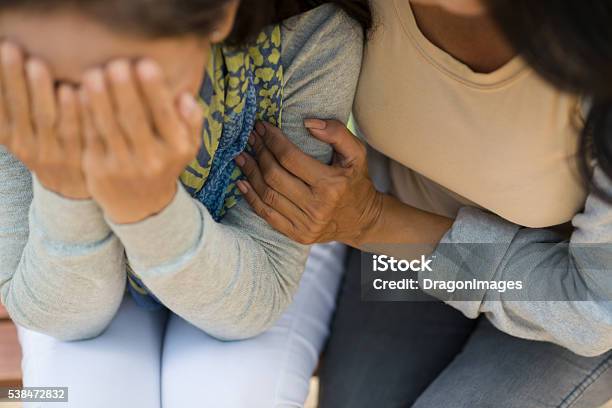 Comforting Stock Photo - Download Image Now - Consoling, Friendship, Embracing