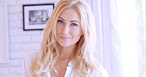 istock Blond Female Smiling at the Camera 538476155