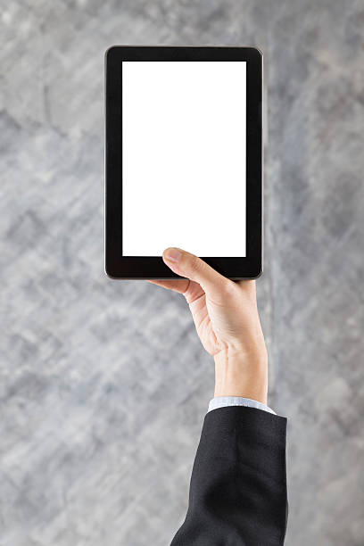 istock businessman hand holding digital tablet 538476400
