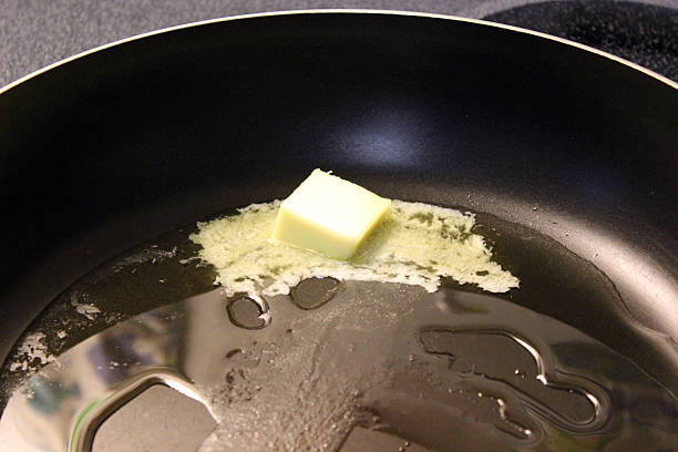 istock Butter Melting in Saucepan with Olive Oil 538478189