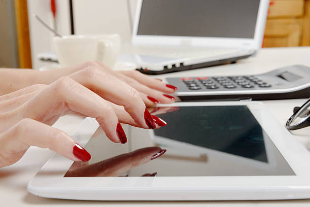 istock businesswoman at the office working on tablet 538481664