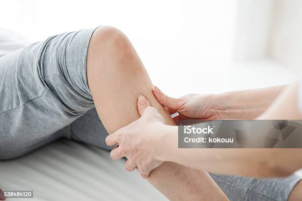 Women Have Been Massaging The Foot In The Gym Stock Photo - Download Image Now - Massaging, Physical Therapy, Pain