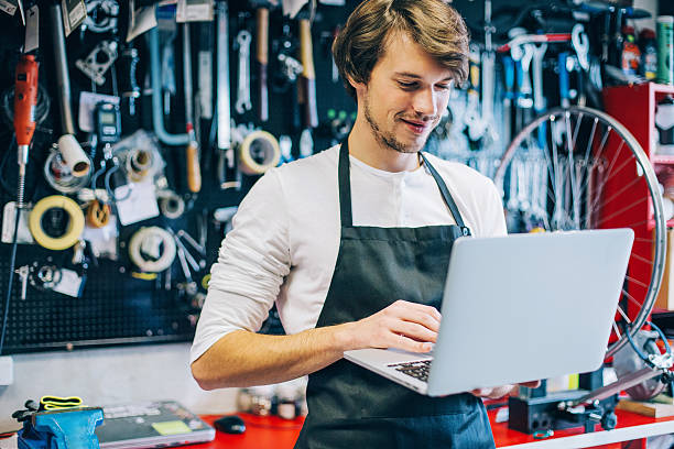 istock Young mechanic with laptop 538484240