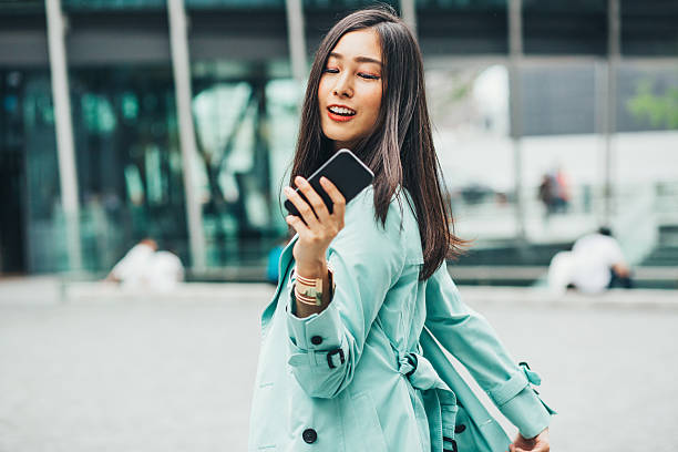 istock Young Asian Ethnicity woman with smart phone 538484794