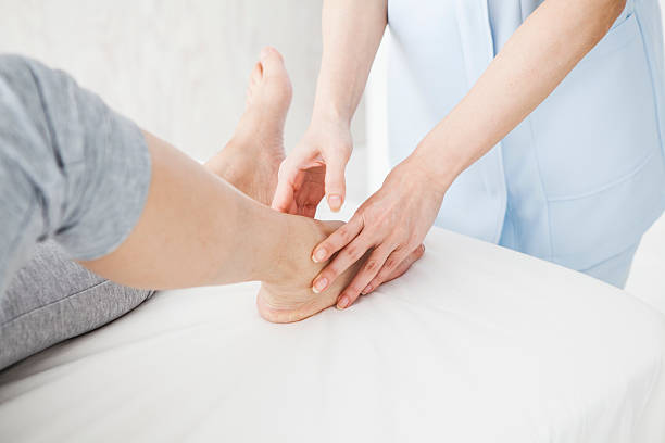 istock People who have been massaging the feet with manipulative 538485252