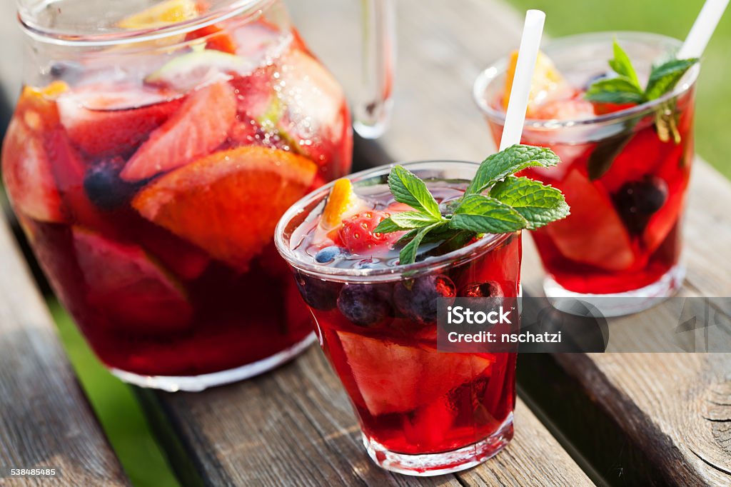 Sangria Refreshing sangria (punch) with fruits, picnic idea Sangria Stock Photo