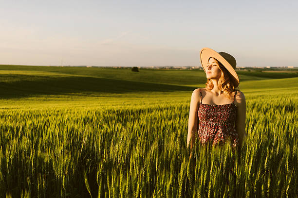 Free picture: Woman in wheat field in a white dress and hat holding a ...