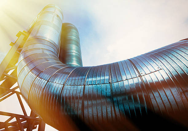 istock Industrial zone, Steel pipelines and cables in blue tones 538490880