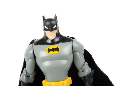 Adelaide, Australia - July 29, 2015: An isolated image of a Dark Knight or Batman Action Figure. Batman is one of DC Comics most popular superheros, spawning many movies, TV series and collectables.