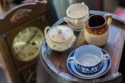 old vintage tea set tableware on shelf
