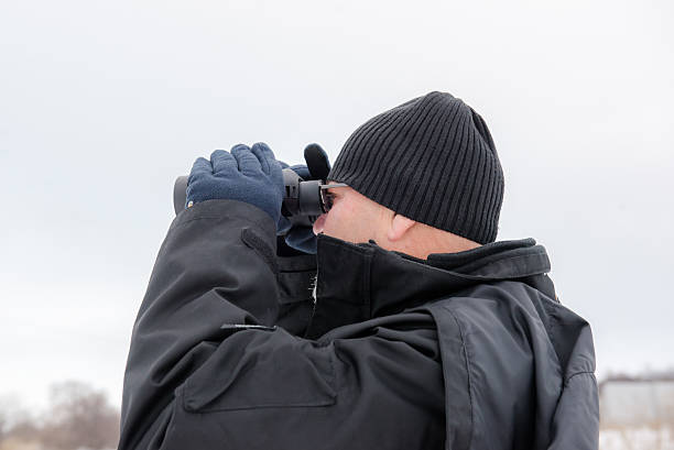 istock Man with binoculars. January  2, 2015, Ukraine, Dnepropetrovsk. 538506159