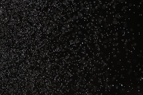 istock snow rain on a black background texture overlay 538506311