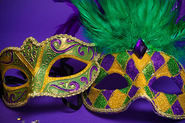 istock Assorted Mardi Gras or Carnivale mask on a purple background 538511229