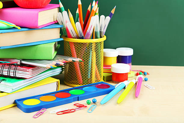 istock Back to school supplies. Books and blackboard. 538512029