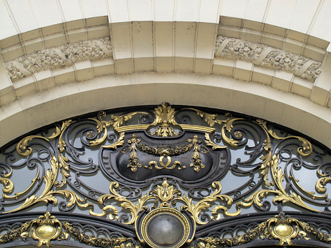 Ornate iron and gold entrance to a palace, 