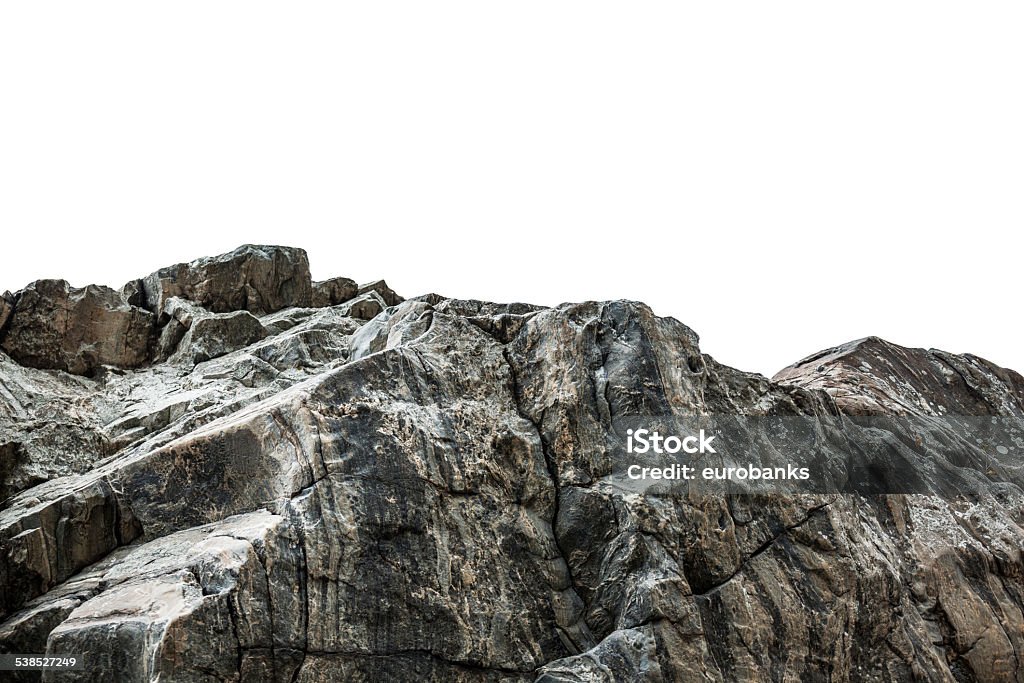 Rocky cliff isolated on white Rocky cliff at a park isolated on a white background Rock - Object Stock Photo