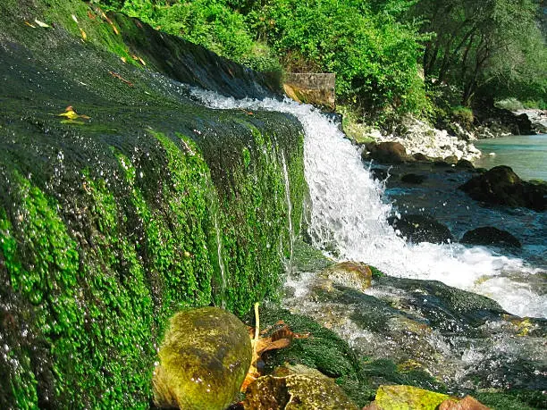 Photo of Low and wide waterfall. Abhazia travel
