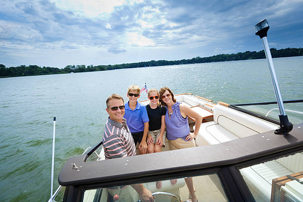 istock Family Summer Vacation Boating in Lake 538528837