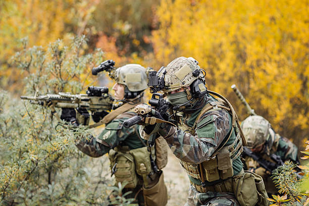 istock group of rangers in ambush 538530849