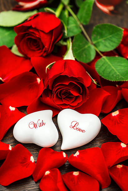 istock Red roses and two white hearts. Valentines Day. With Love 538533971