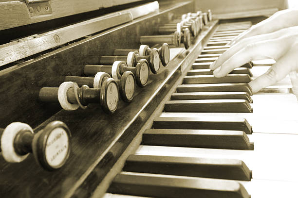 istock close up hand play vintage piano 538535295