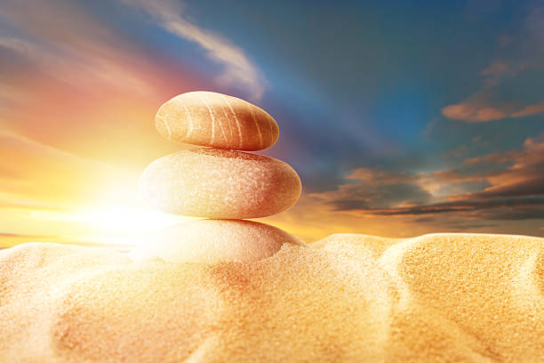 istock Sand and sea stones on sunset 538560762