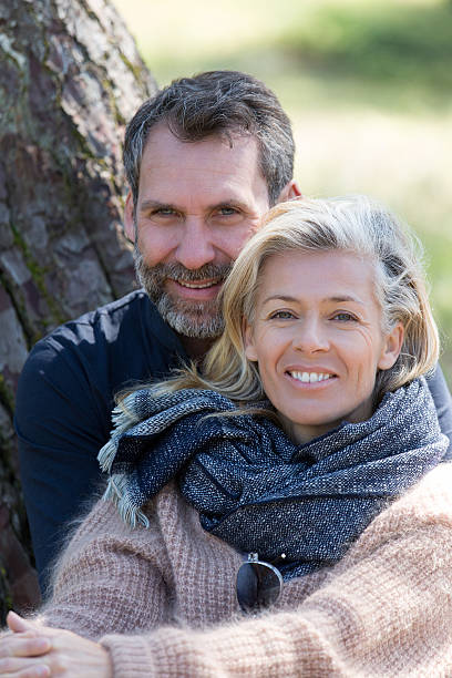 istock middle aged couple in park 538561026
