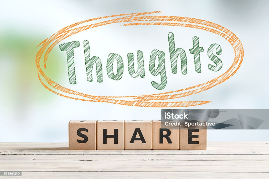 Share your thoughts sign on a desk Share your thoughts sign on a desk made of wood Advice Stock Photo
