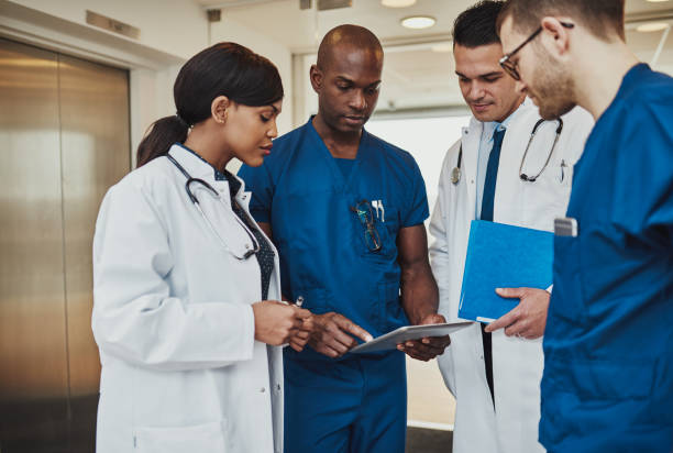 istock Multiracial team of doctors discussing a patient 538561848