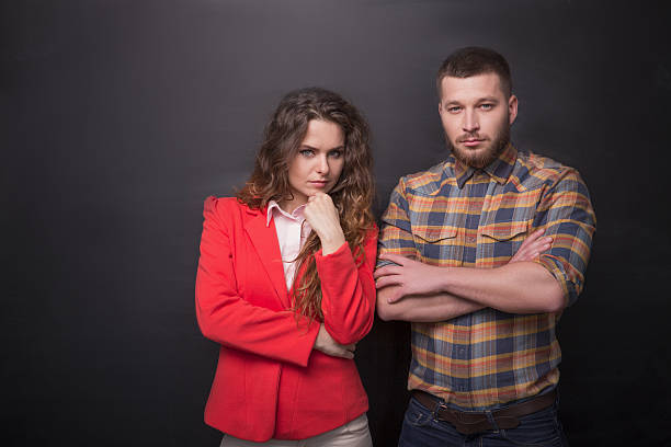 istock Business man and woman in studio 538564386