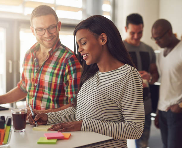 istock Attractive male and female co-workers at desk 538564870