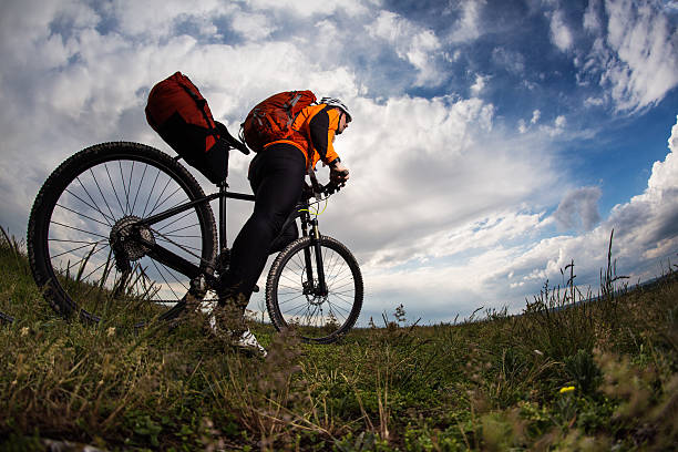 istock Young man is riding bicycle outside. Healthy Lifestyle. 538564972