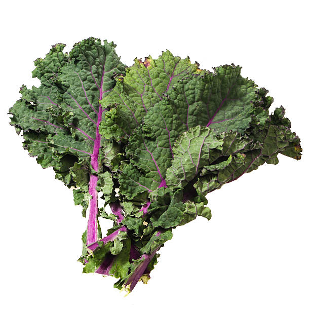 istock Green kale leaves isolated on white 538566545