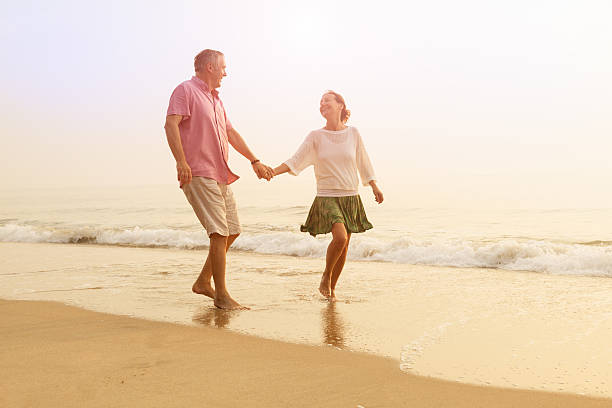 istock Happy senior couple outdoors on the beach 538566614