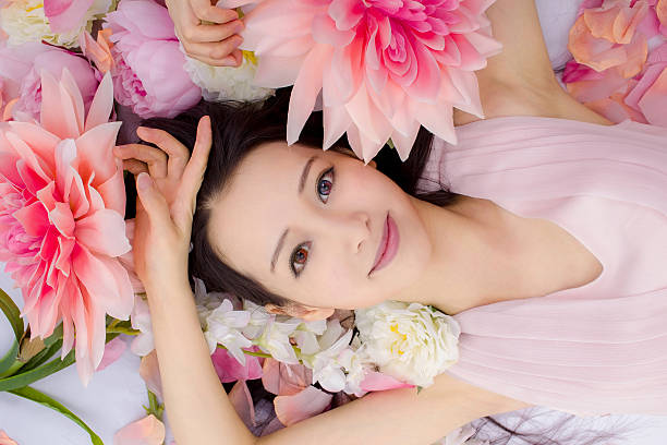 istock girl in flowers sleeping spa 538567621