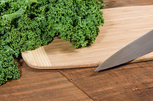 istock Green curly kale and knife 538567883