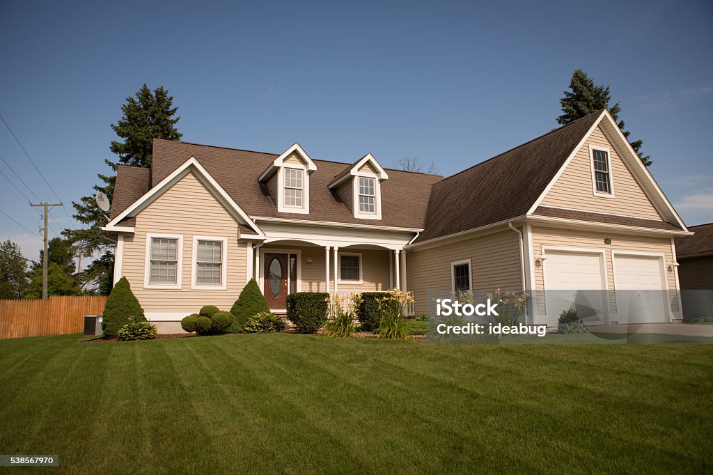 Single Family Ranch Home in Eastern Michigan, House Color stock photo of a single family ranch home in Eastern Michigan during summer. Residential Building Stock Photo