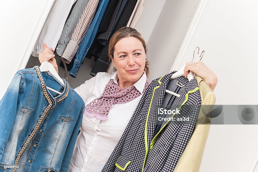 What To Wear Stock Photo - Download Image Now - Closet, Mature Women ...