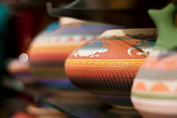 Southwestern Style Pottery on a Shelf This pottery was from New Mexico and had the traditional southwestern colors and patterns santa fe new mexico stock pictures, royalty-free photos & images