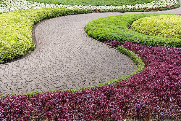 istock Brick path in the flower garden 538568502