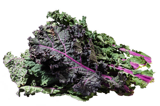 istock Green kale leaves isolated on white 538568923