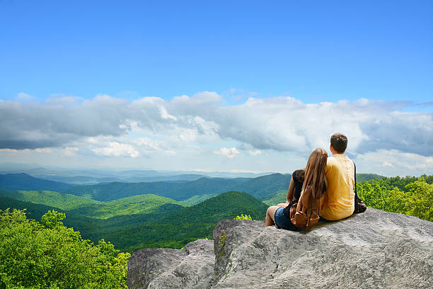 istock Family hiking in autumn mountains. 538569064