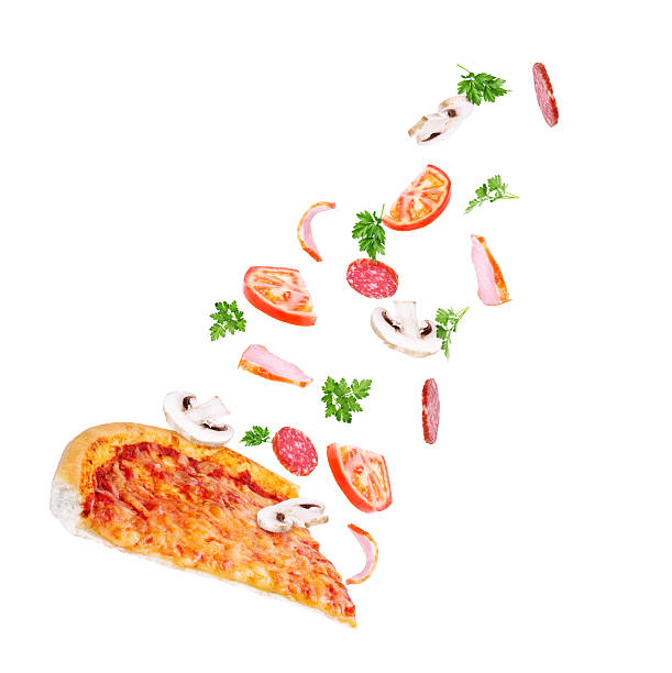 istock Vegetables fly to pizza on a white background 538569152